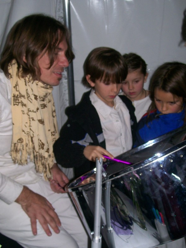 Children and pans at The Tree of Life